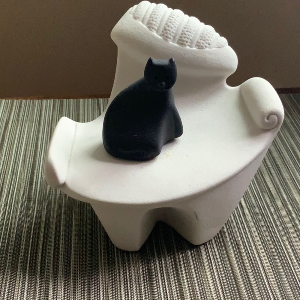 Cat on chair statue